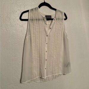 White sheer sleeveless blouse